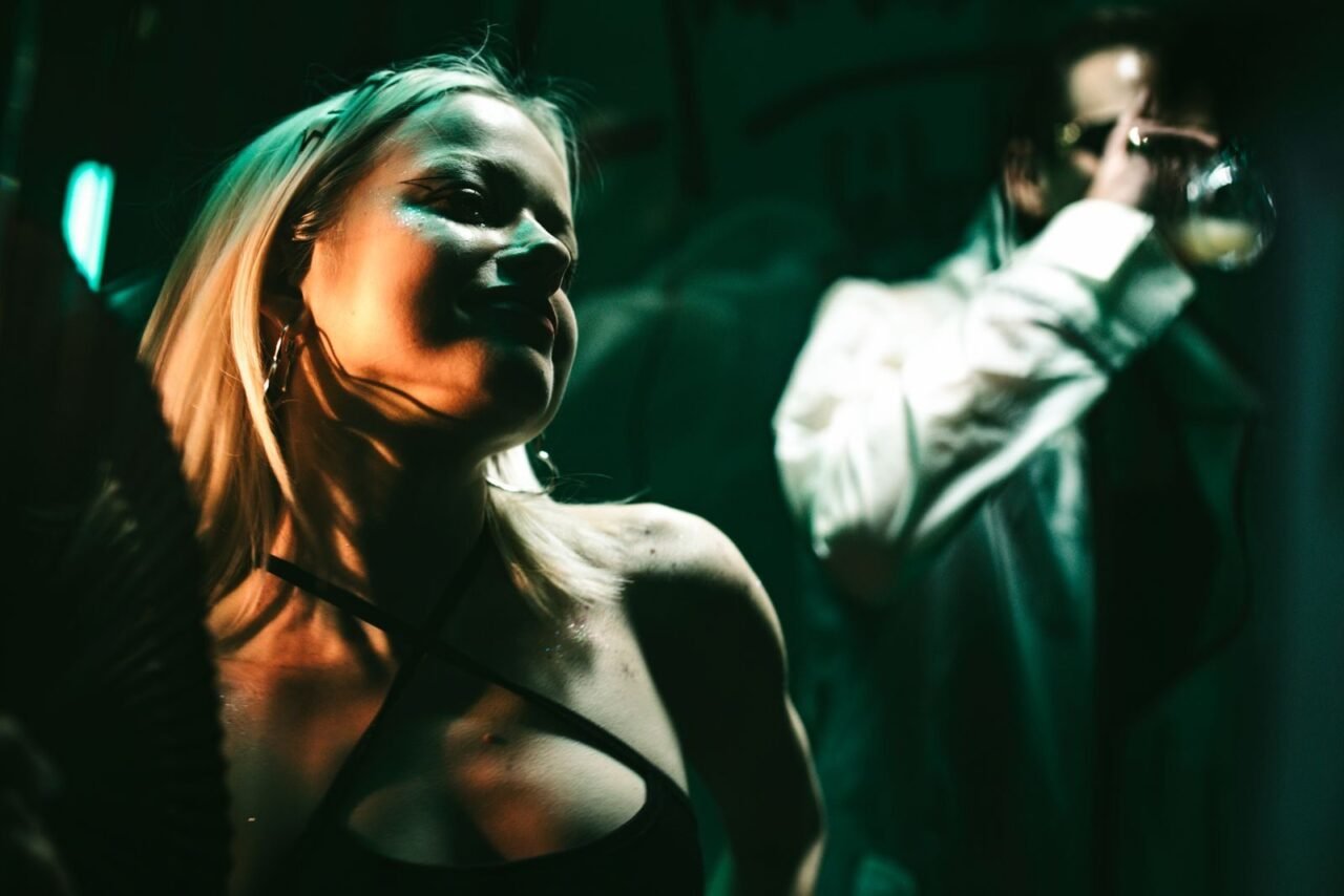 Two adults enjoying a lively night out at a Lwiw nightclub, embodying the vibrant Ukraine nightlife.