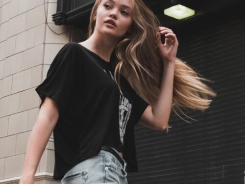 woman walking near building