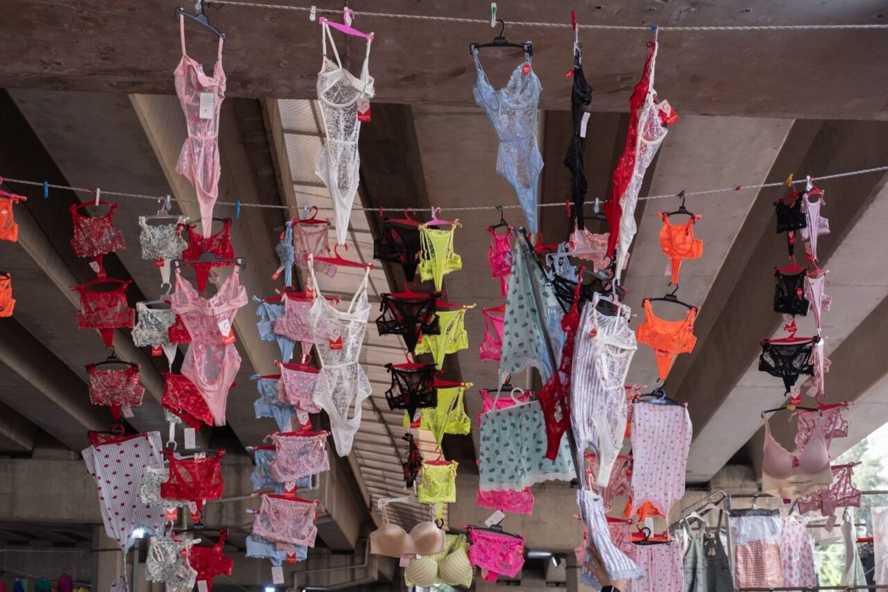 Colorful lingerie hanging display under a bridge in Bornova market, İzmir.