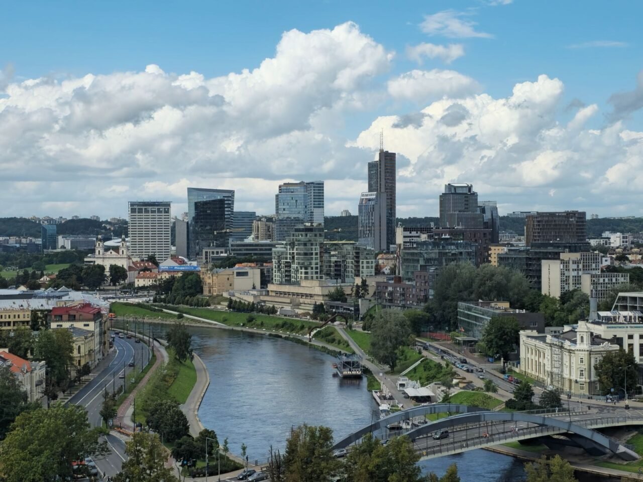 Stunning day view of Vilnius city skyline with the Neris River and modern architecture.