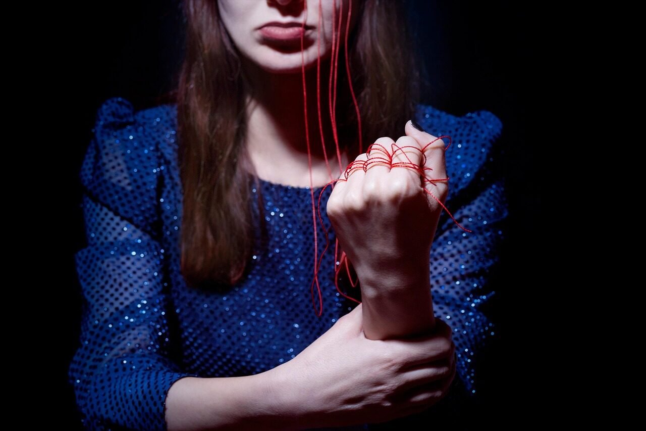 fist, string, woman, red string, tied, hand, arm, gesture, girl, closeup, red string, red string, red string, red string, red string, tied, gesture