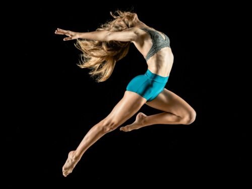 woman jumping and reflex her body