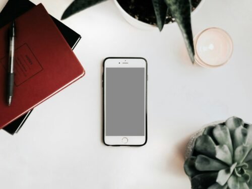 photo of iPhone on white surface