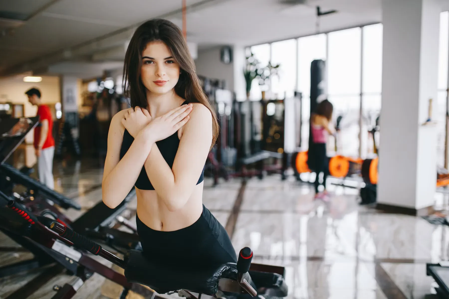 Beautiful girl is engaged gym