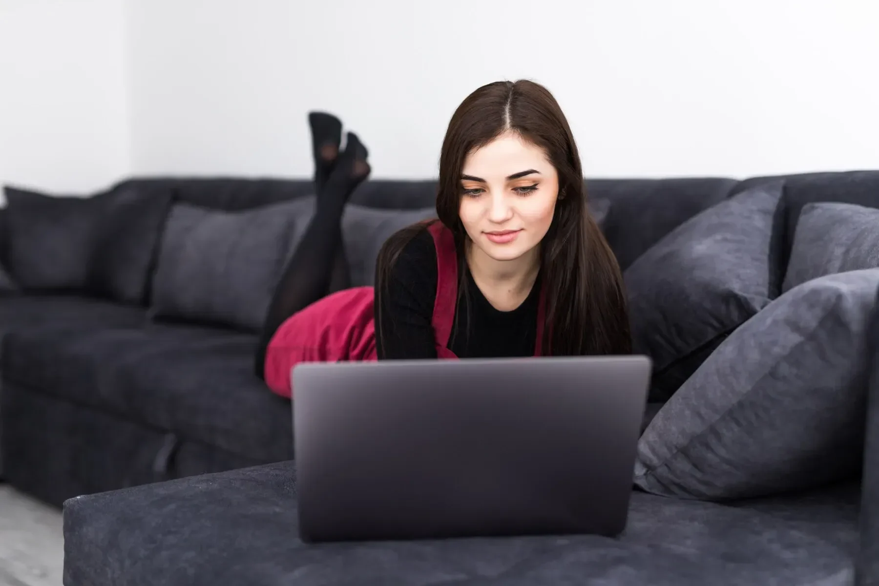 Beautiful young lady working laptop home