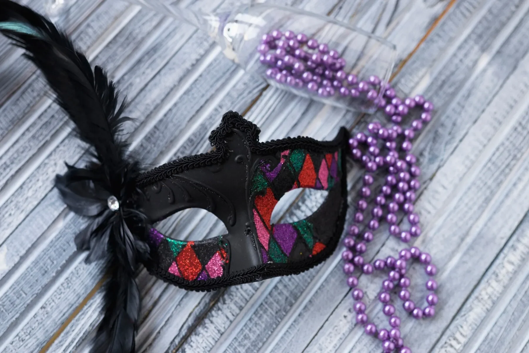 Close up mask with feather beads