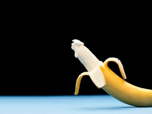 yellow banana fruit on black surface