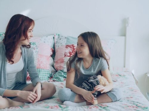Mother and daughter are having a conversation.
