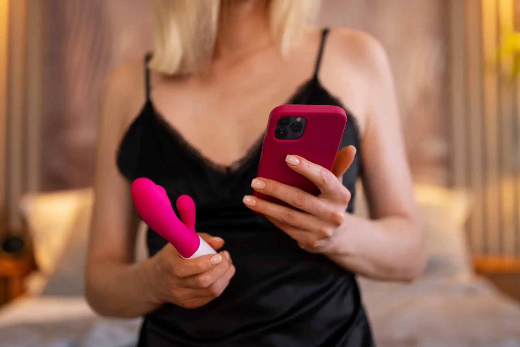 Front view woman with smartphone vibrator
