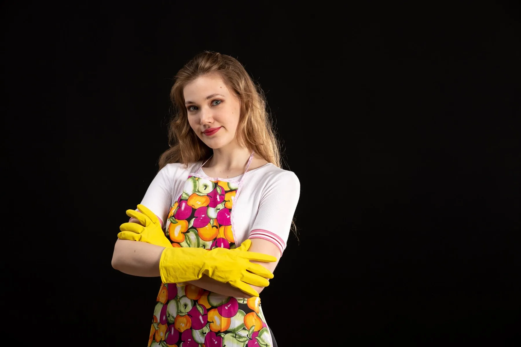 Front view young attractive girl colorful cape smiling wearing yellow gloves black background love smile positivity