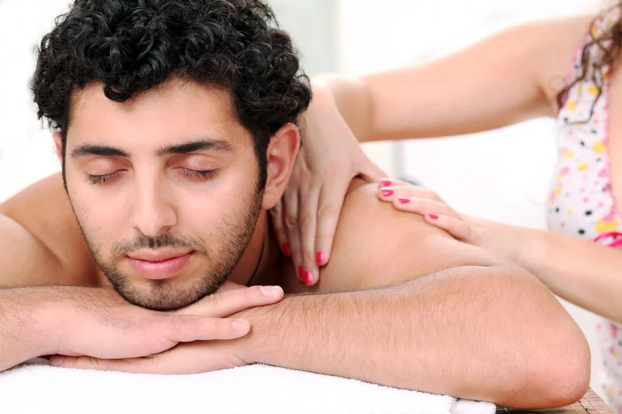 Handsome guy enjoying massage therapy 144627