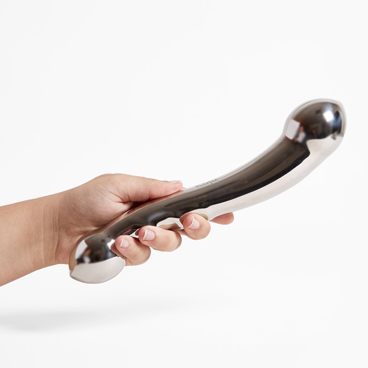 'Njoy Eleven', a polished stainless steel massager held in a hand with a curved shape