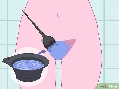 Step 5 Brush the dye onto your pubic hair.