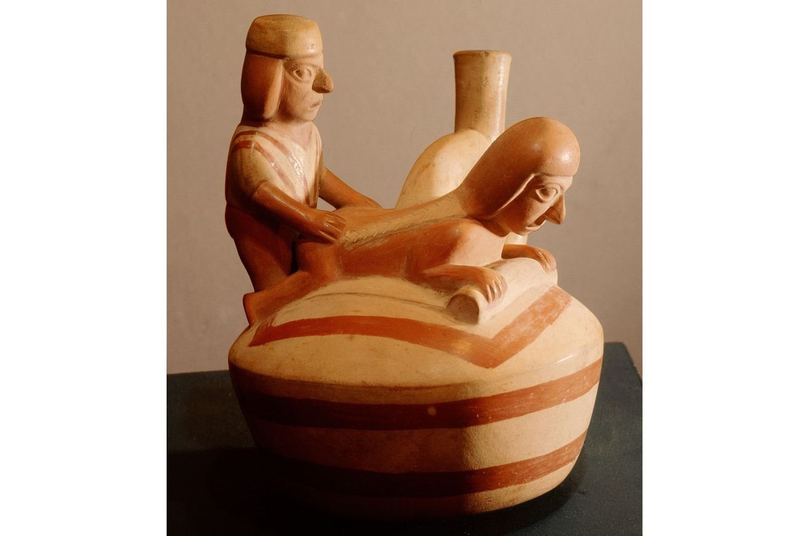 Image may contain Figurine Pottery Jar Art Sculpture Vase and Wood