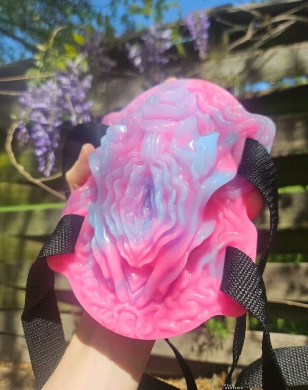 Synstyl pussy grinder super soft silicone vulva, in hand