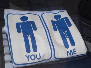 men toilet sign with small penis and big penis