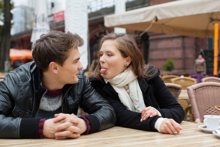 girl teasing boy