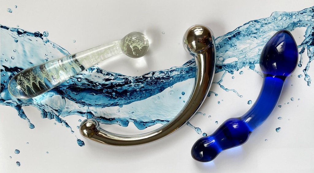 Njoy Pure Wand, Firefly G spot wand, and glass dildo comparison showing curved shapes for G spot stimulation