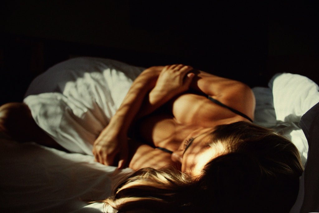 Woman hugging herself
