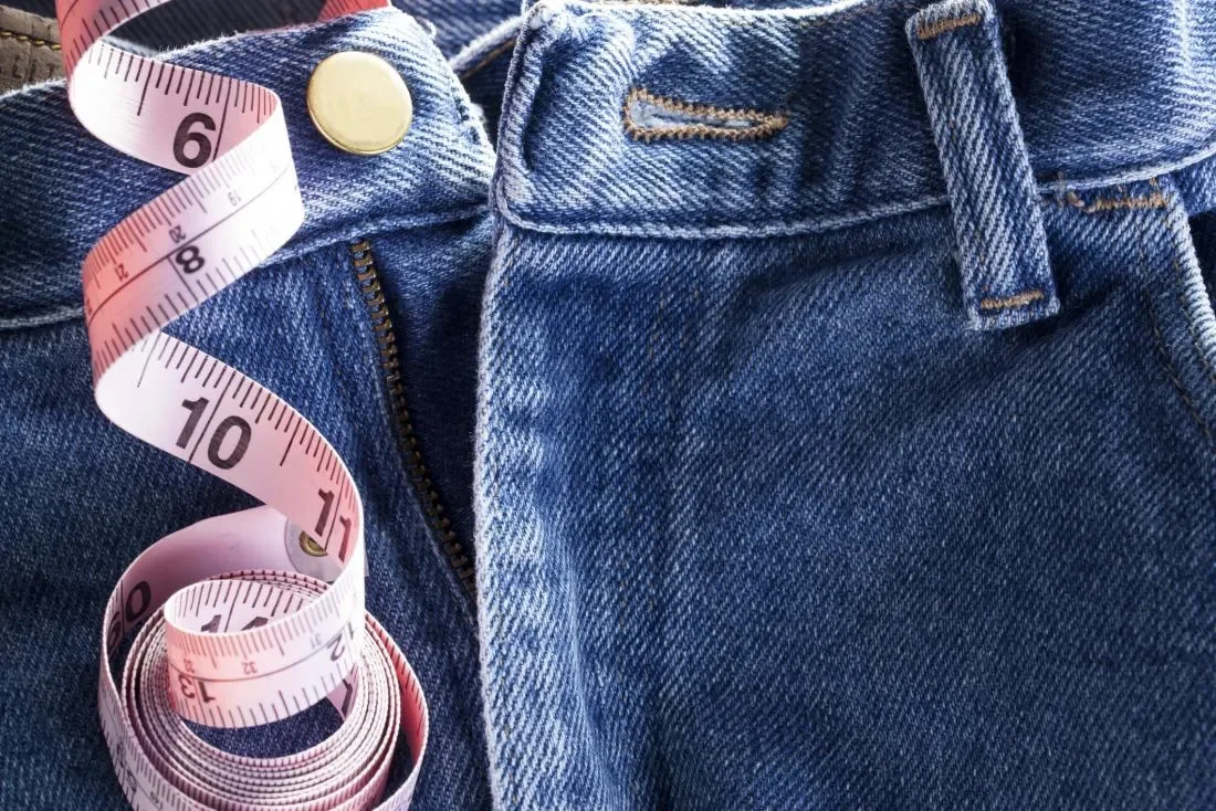 Jeans and measuring tape