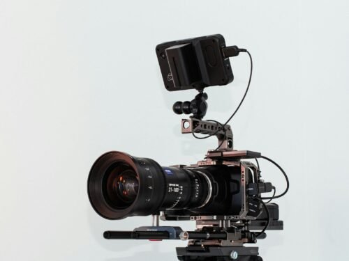 black dslr camera on white table