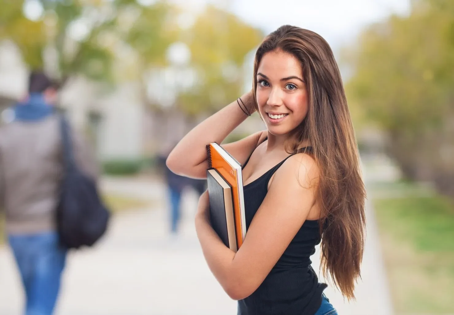 Joyful teenager before going study