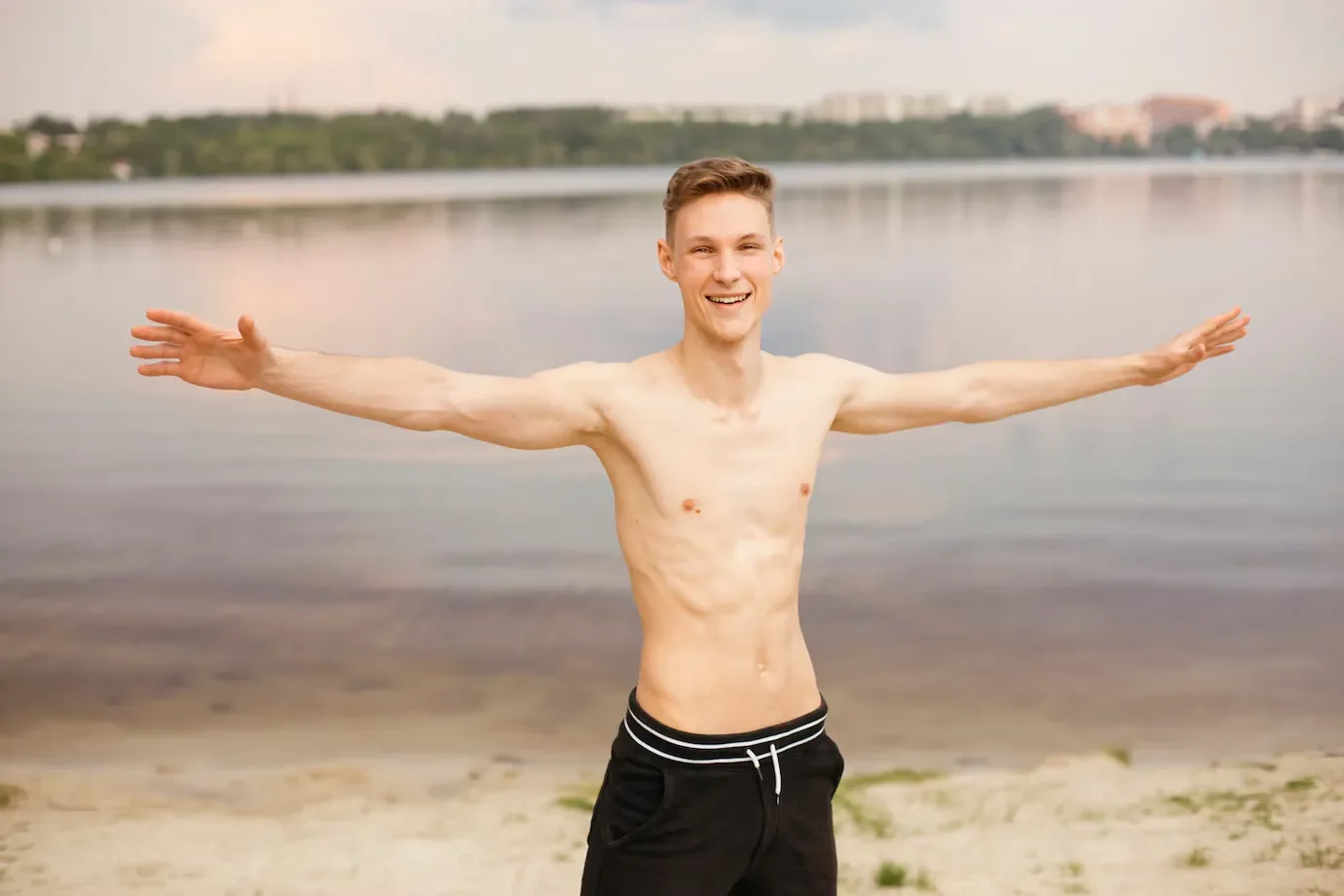 Medium shot smiley boy with outstretched arms