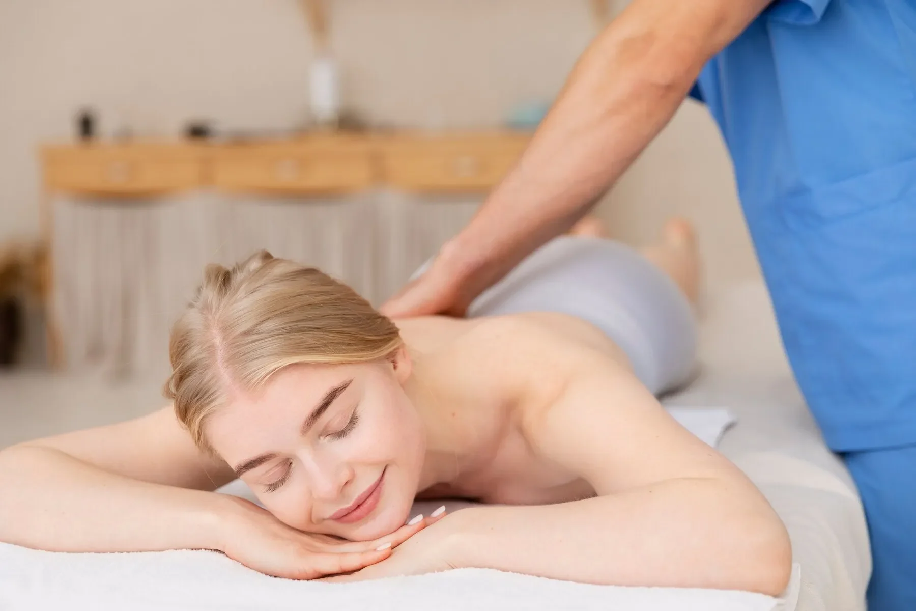 Nurse with patient osteopathy