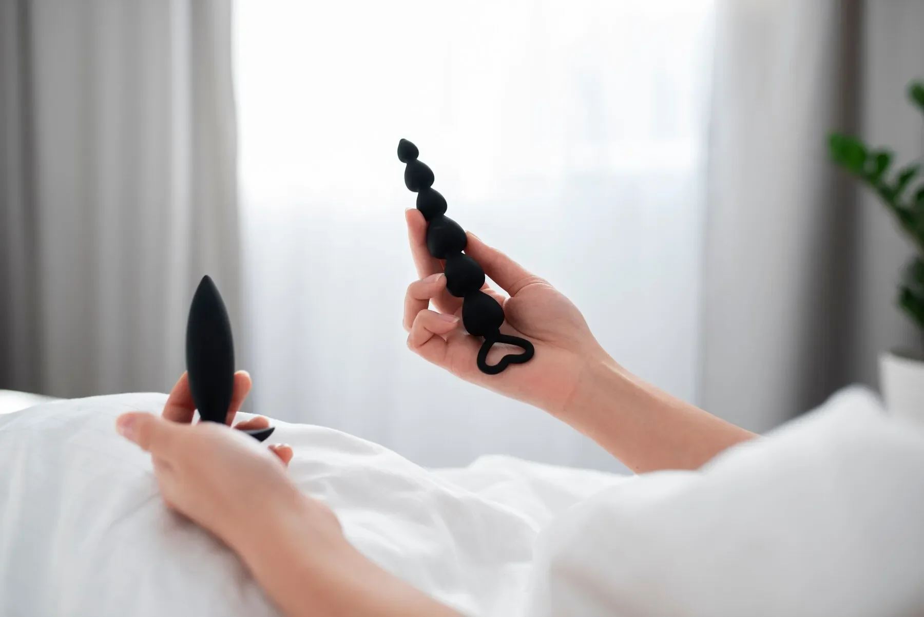 Person with sexual toy bed