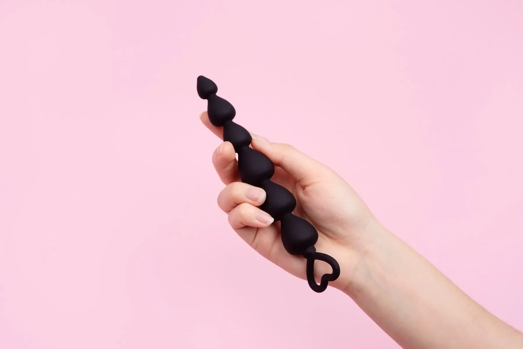 Person with sexual toy
