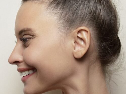 a woman with a bun in her hair