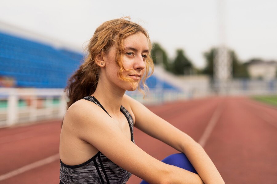 Portrait beautiful sportive woman stadium