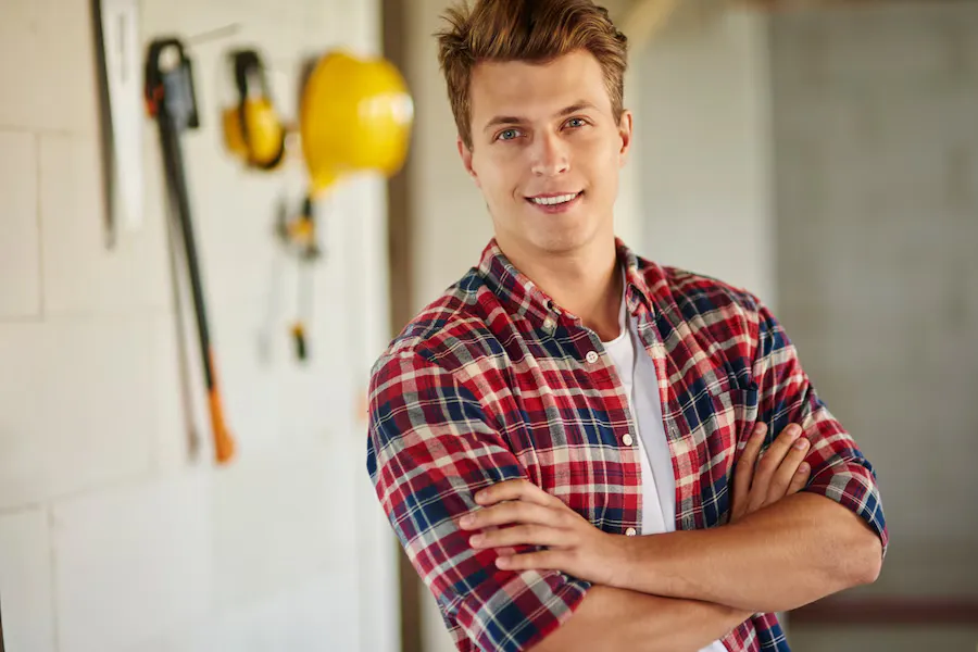 Portrait confident young carpenter result