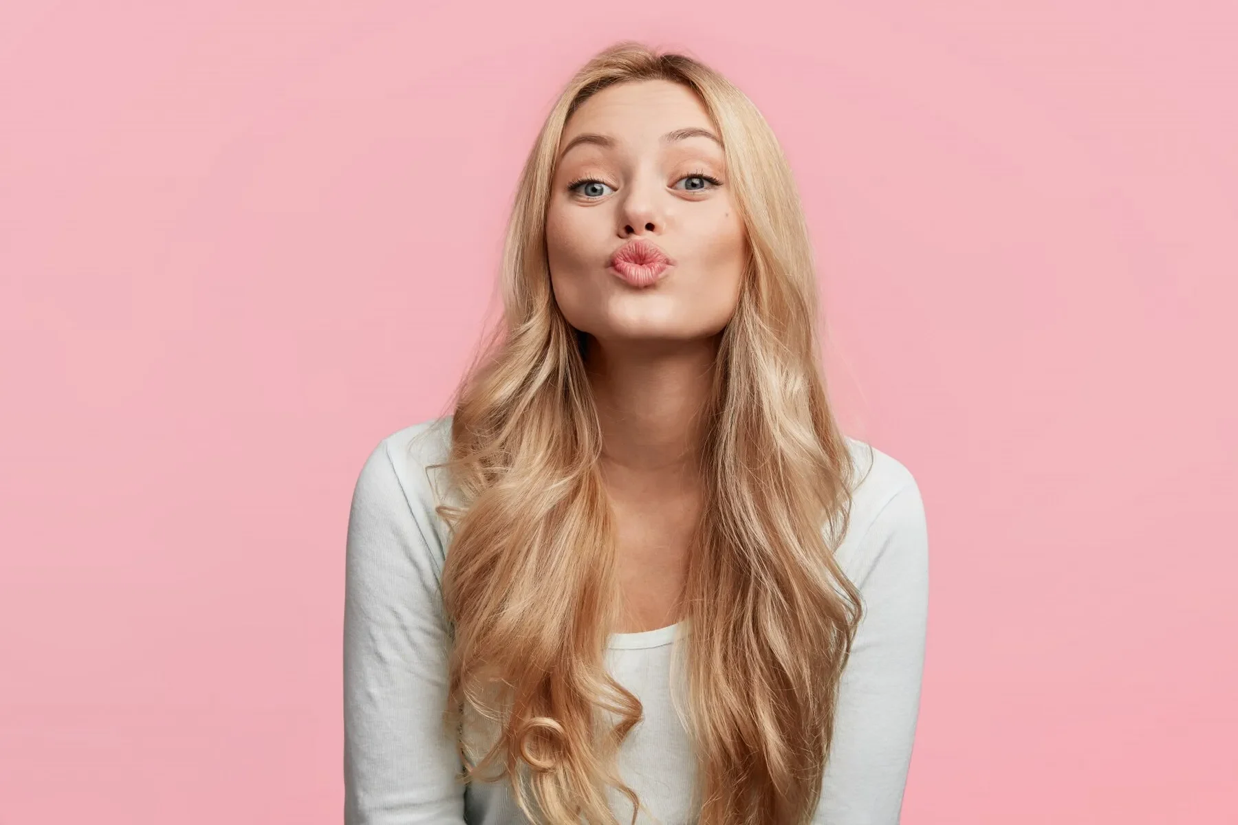 Portrait young blonde woman posing