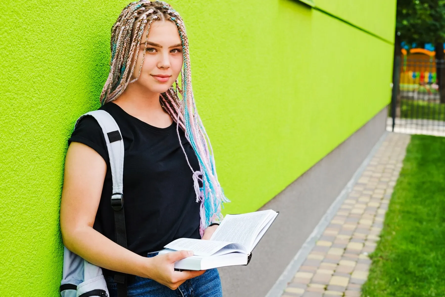 Pretty student posing university
