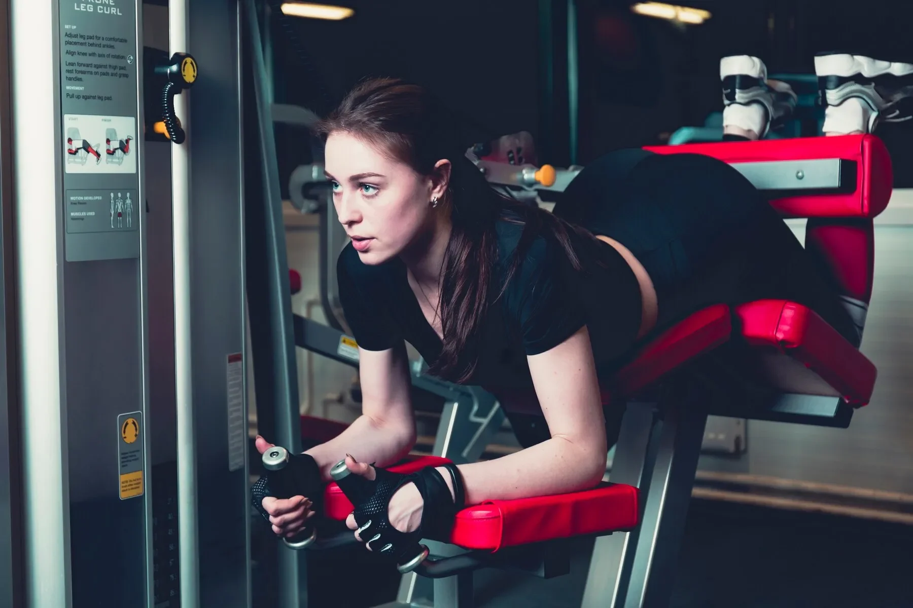Sporty woman doing fitness exercise gym