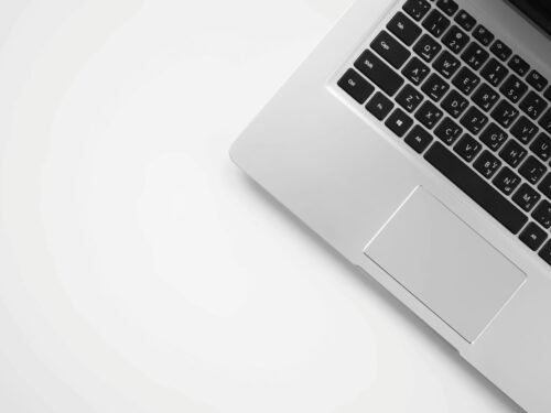 MacBook Pro on white surface