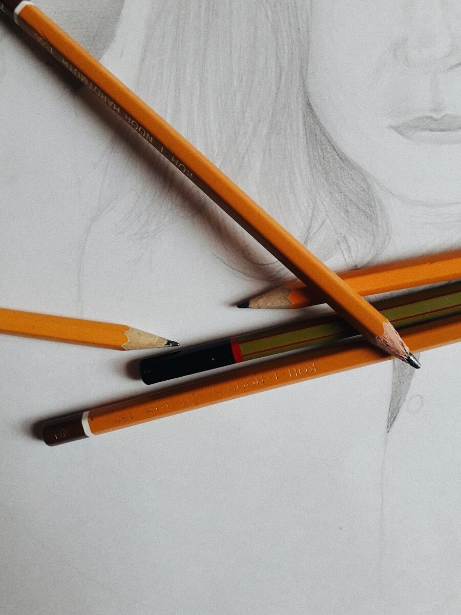 brown and black pencil on white paper