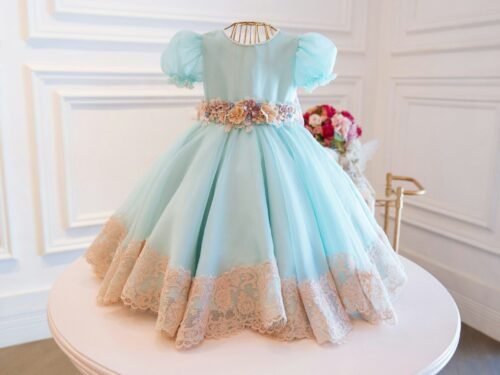 white floral lace dress on white table