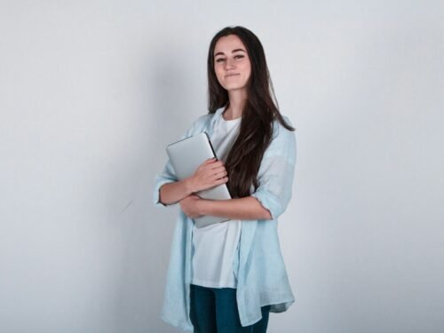 a woman holding a tablet