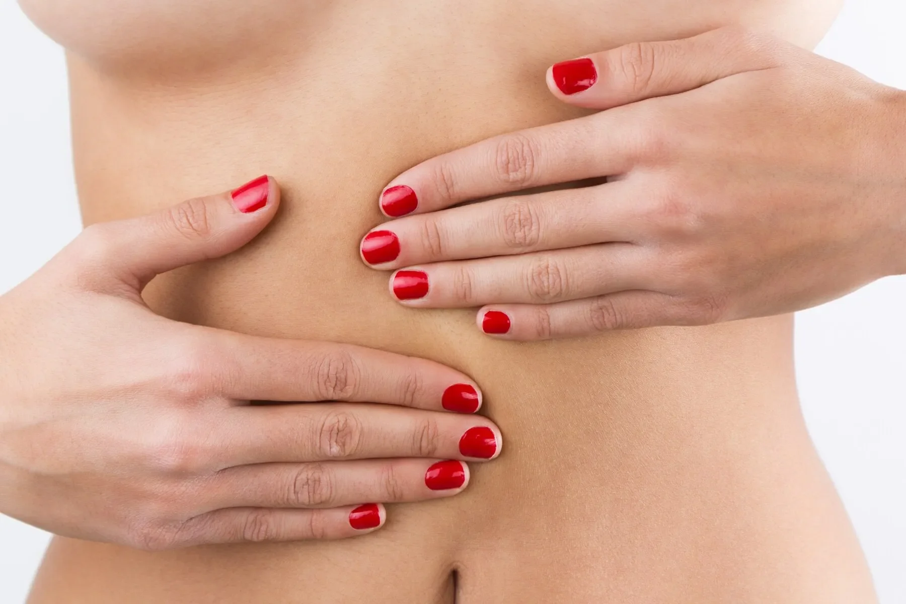 Woman s hands belly isolated white background