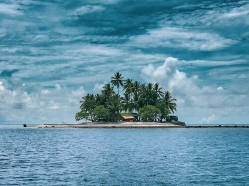 photography of island against sky