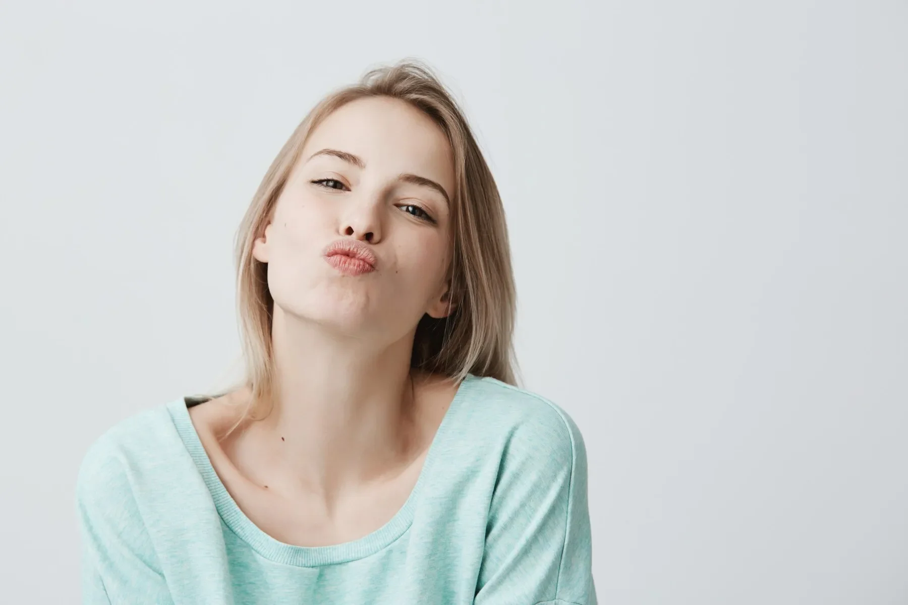 Young attractive caucasian woman dressed blue casual clothes