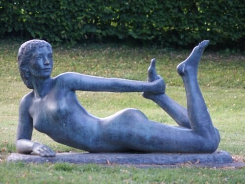 a statue of a person holding a sword